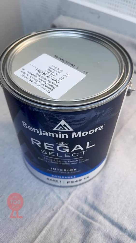 The little moments: crack the can, pour the paint, get to work.