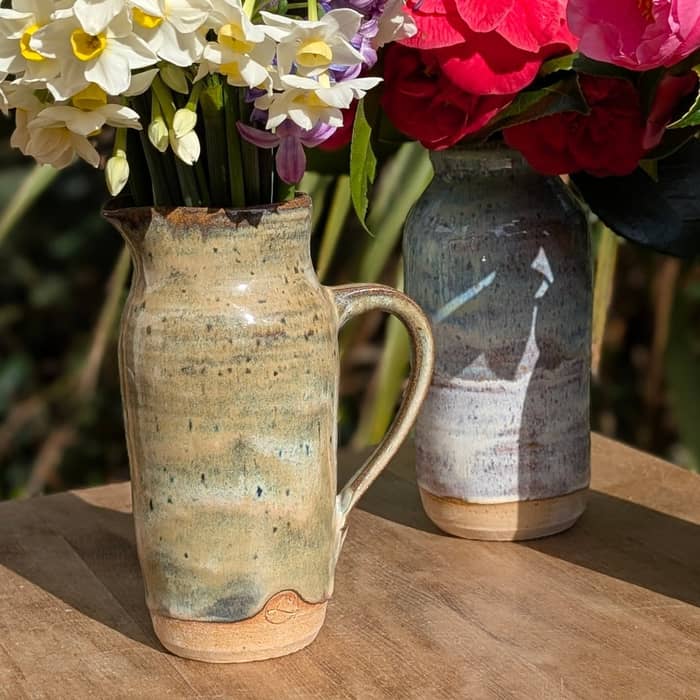 It's a beautiful day, the flowers are out in their glory, and mother's day is just around the corner. Out on the wall stall there's a selection of vases, jugs and mugs to make the special ladies in your life smile.