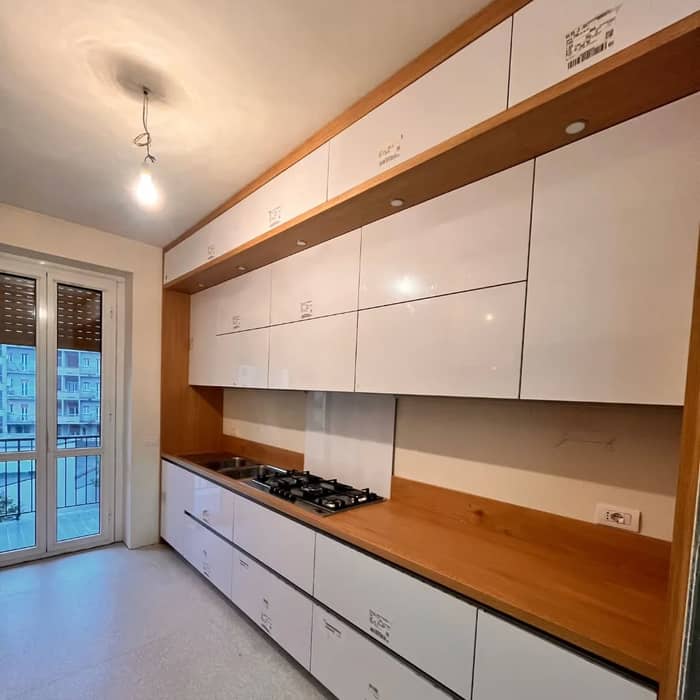 Cucina ante bianche laccate top in rovere

massello