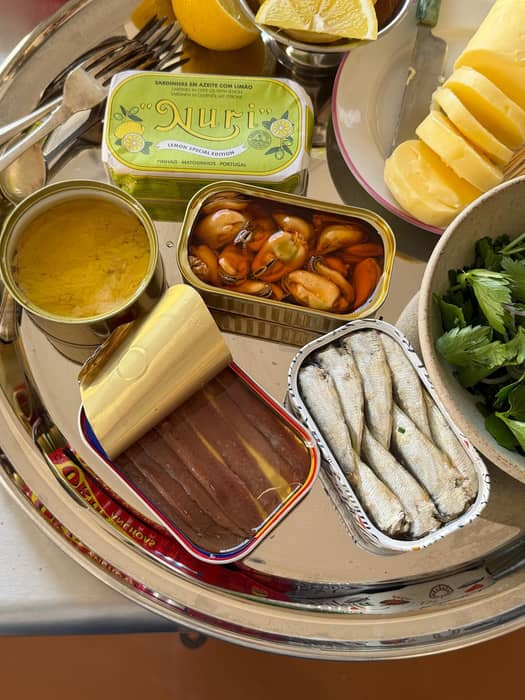 Sunday. A tinned fish buffet with Vermouths then a roast chicken, braided shallots and lentils, crème fraiche and vinegar dressed herbs.