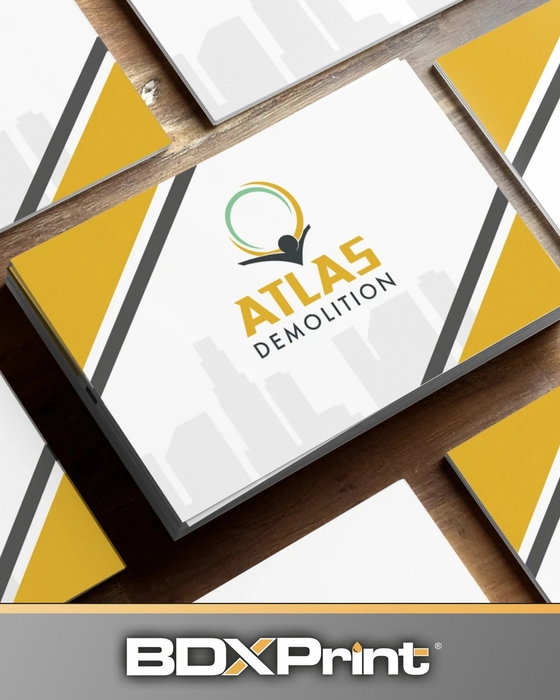 Cartes de visite pour ATLAS DEMOLITION.

Aplats ambre et gris, logo centré, silhouette de ville en f