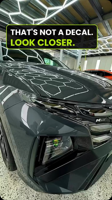 Those lines on the bonnet aren’t a wrap. They’re the ceiling. Grey Tucson N…