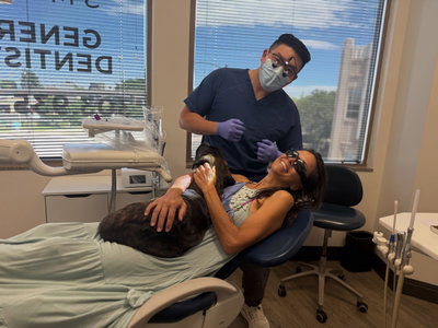 Dr Li at @belmarsmiles taking patient care to a whole new level  #lakewood #colorado #dentistry #PatientCare #puppies