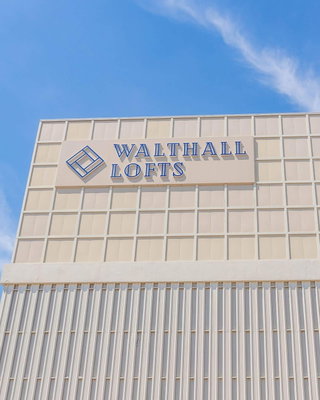 Before we talk about what’s coming next, it helps to look at what’s already been built. Walthall Lofts started as a shu