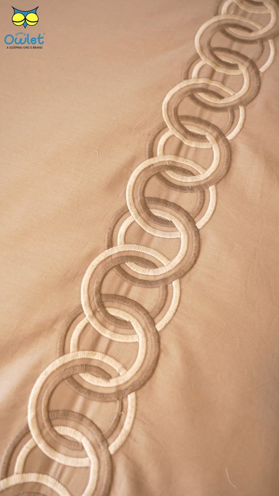 ✨ A Touch of Grace, A Statement of Luxury. ✨

Introducing Eterna Chain – 400 TC from the Tone & Thread Collection by House of Owlet. 🤎

Featuring a sophisticated chain-inspired embroidered border in a timeless beige palette, this exquisite bedsheet brings understated luxury and refined elegance to your bedroom. A perfect blend of graceful design and premium comfort, made for those who appreciate the finer details.

Because true luxury never goes out of style. ✨

🛏️ Discover Eterna Chain 400 TC
🤎 Elevate your everyday living with House of Owlet.

#HouseOfOwlet #ToneAndThread #EternaChain #LuxuryBedsheets #400TC #PremiumBedding #ElegantInteriors #BedroomStyling #LuxuryHomeDecor #BeddingGoals #BedroomMakeover #BecauseYourSleepMatters
#Sleepingowlsinhouse