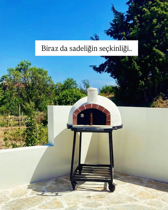 🔷 Bir köyde yahut sahil evindeki bahçenin bütünlüğü içinde Buka tüm alanı kucak