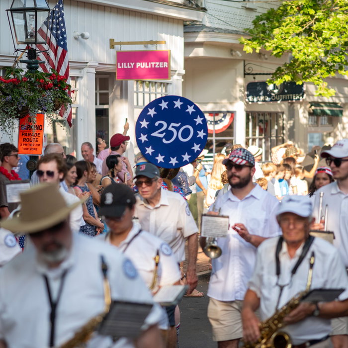The 4th of July in Edgartown 🇺🇸Pipe bands marching down Main Street, front porches dressed in red,...