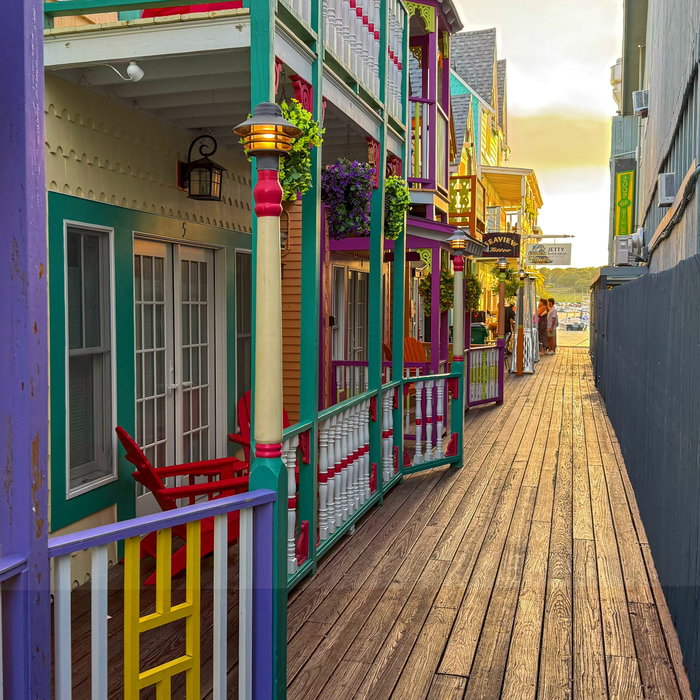 Summer time in Oak Bluffs just hits different, colorful buildings and sunset by the harbor .Visit:...