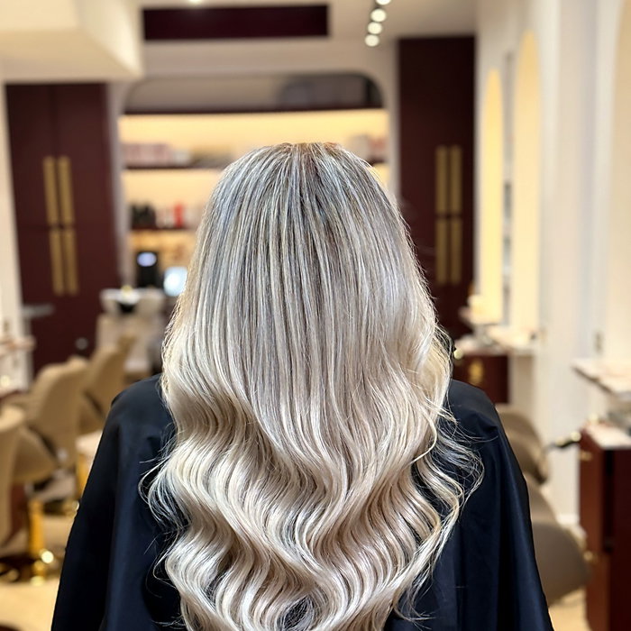 Champagne blonde, sculpted into mirror-gloss waves 🤍 Bespoke colour and a finish built to last — by Hakim Elhocine, Ma…