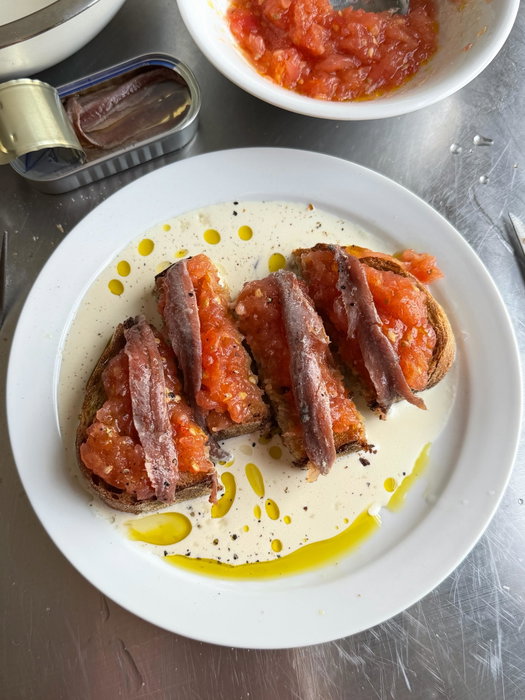 Fresh grated tomatoes, salty anchovies and toast on a pool of my ajo blanco (from this month’s newsletter). Crunchy/ creamy/ salty/ fresh/ soggy and really good.