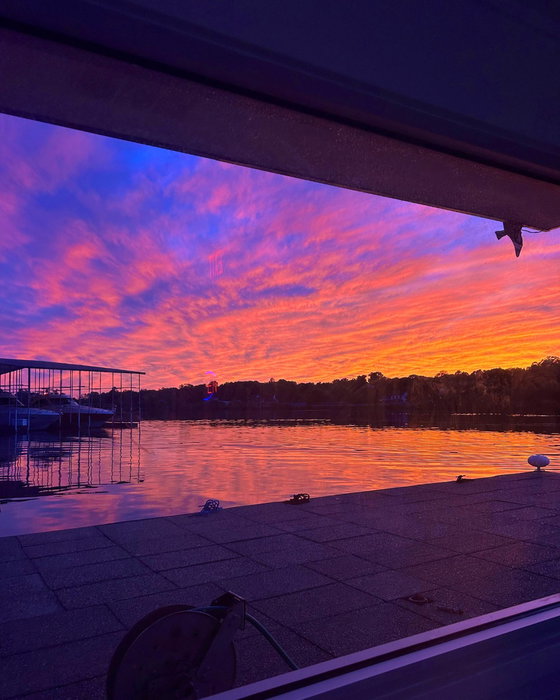 Peaceful water, colorful skies, and your favorite spot on the lake.

It doesn't get much better than this. 🌅 🙌