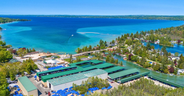 If summer had a postcard, it might look something like this. 🌊☀️

Surrounded by crystal-clear water and some of Northern Michigan's most beautiful boating destinations, Torch River Marina is where countless summer adventures begin.