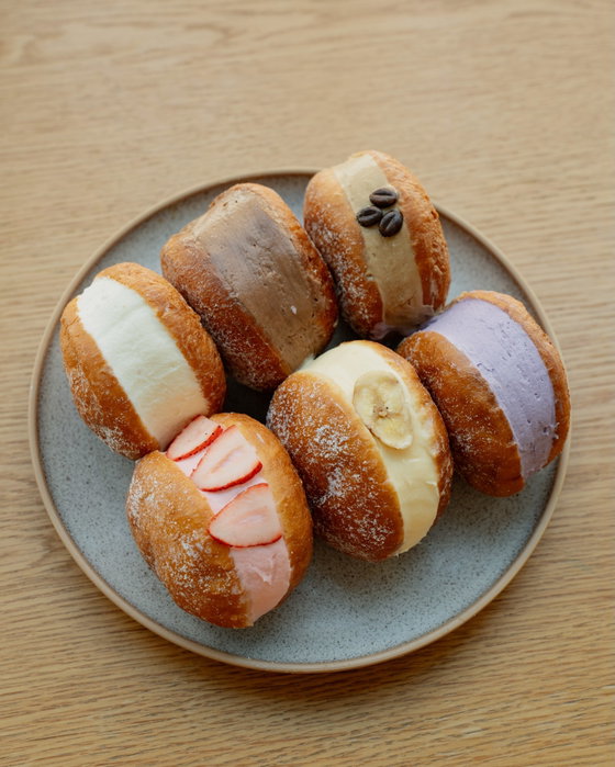 Everyone comes for the coffee, but stay for this. 🍩✨ @seedwaterbp’s pastries are beautifully made, cream filled and pac