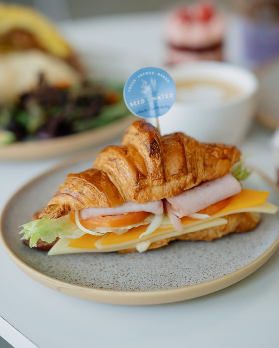 Ham, cheese, buttery layers!! 🥐🧀 Come by Seed and Water and enjoy a ham and cheese croissant or two

#seedandwater #ha