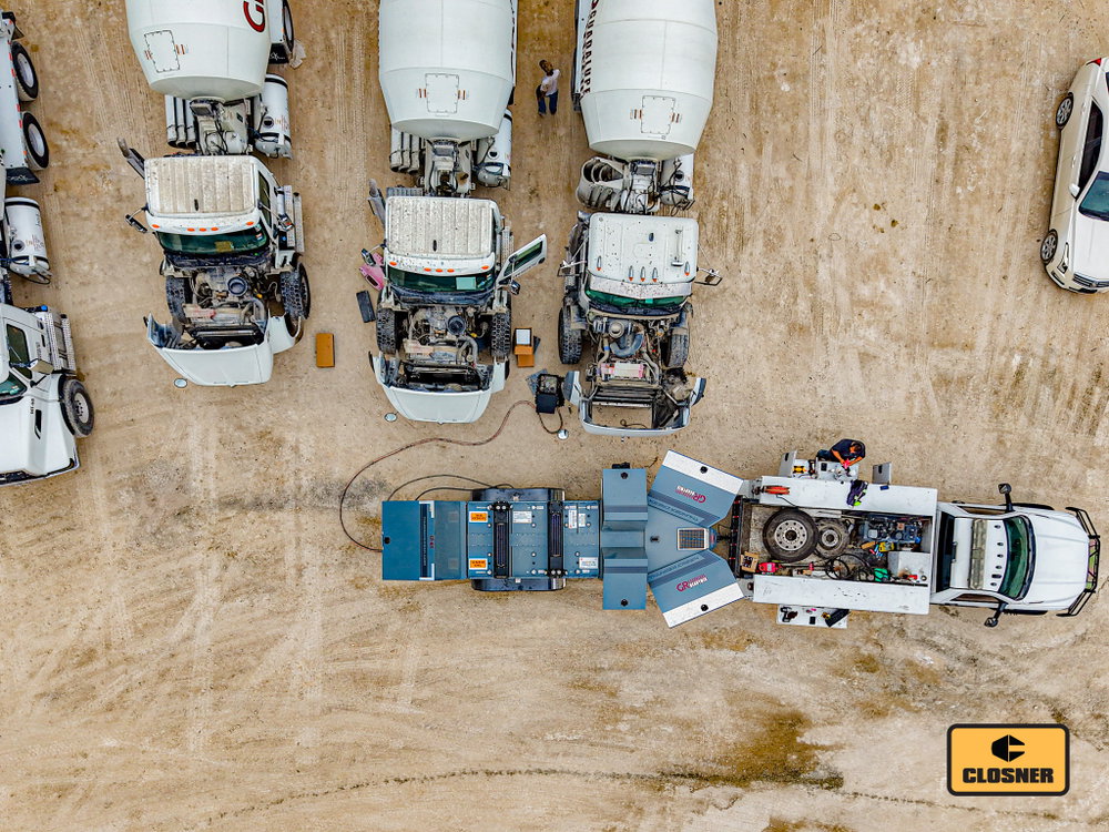A bird's-eye view of productivity. The Thunder Creek SLT-690 is helping keep this mixer truck fleet serviced and ready for the next day's work.