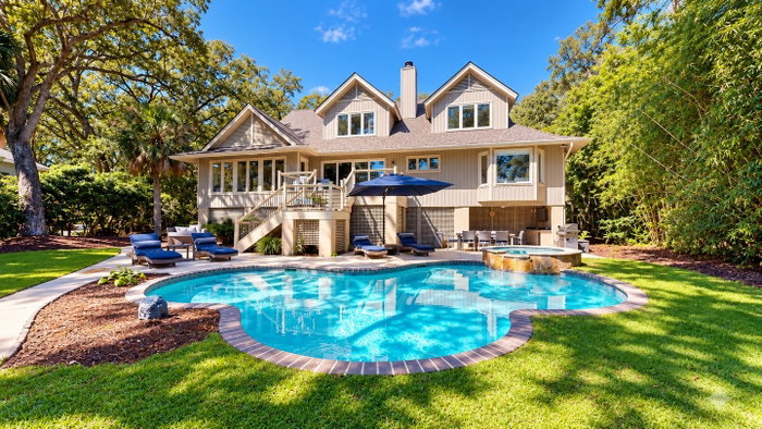 We would like to welcome 2 Lookout to our vacation rental program❗️This stunning 5-bedroom 4.5-bathroom 13 guests home blends coastal charm with spacious, beautifully designed interiors and incredible outdoor living. 🏠🌴😌

White shiplap walls, built-in cabinetry, open shelving, comfortable furnishings, a fireplace, and abundant natural light create an inviting blend of coastal elegance and rustic charm. Outside you'll enjoy a private pool and spa, poolside bar, fishing dock, lagoon views, and plenty of space to swim, gather and unwind. Perfect for family vacations, group getaways, and making unforgettable Lowcountry memories! ☀️🌊🌴

To view the listing for 2 Lookout and to reserve your stay, visit the 'Vacation Rentals' link in our bio or call 877-567-6511 to speak with one of our vacation planners.