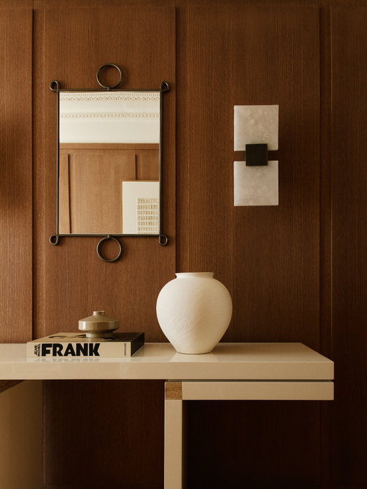 Highstay instagram Console in cream lacquer, travertine, and polished nickel, custom-designed by our in-house studio.