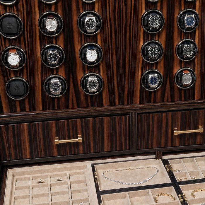 Watches above. Diamonds below.
Eterna™'s microsuede-lined drawers hold more than time — rings, neck