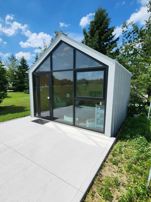 Exterior

Our client chose the Monarch for it's clean lines, open interior space and unobstructed glass wall. The vision was for her customers to be within a peaceful environment during the final moments with their beloved pets.

Certainly an medical room above and beyond what most veterinarian offices would offer, overlooking a vast farmer's field.

The no maintenance exterior cladding and ability to customize was also a big selling point. Let's take a look inside next.

#VeterinaryDesign #PetComfort #ModernArchitecture #CustomSpaces #PeacefulEnvironment #InnovativeVetCare