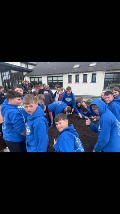 6th class enjoyed planting potatoes in our garden this morning.